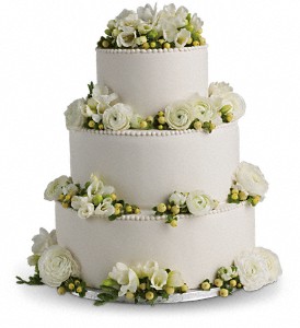 Freesia and Ranunculus Cake Decoration in Centralia IL, Ross Flower Shop